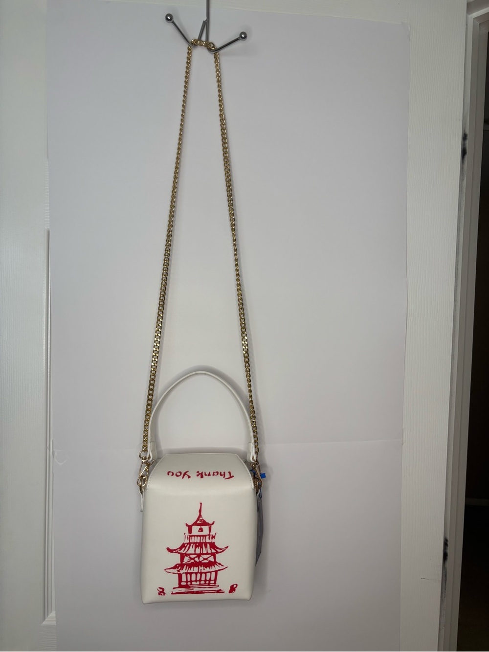 White Crossbody Bag with Red Pagoda Print and Gold Chain Strap